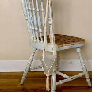 Super cute boho style plant hanger. Glass planter included!